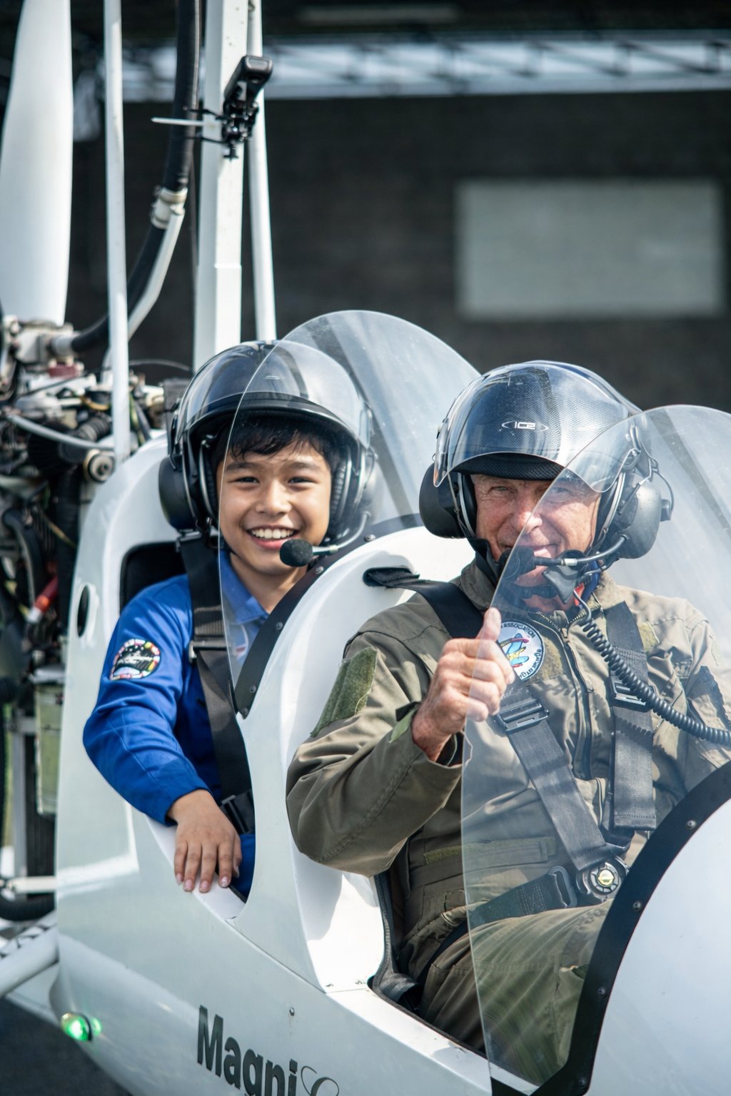 Young passenger in gyrocopter